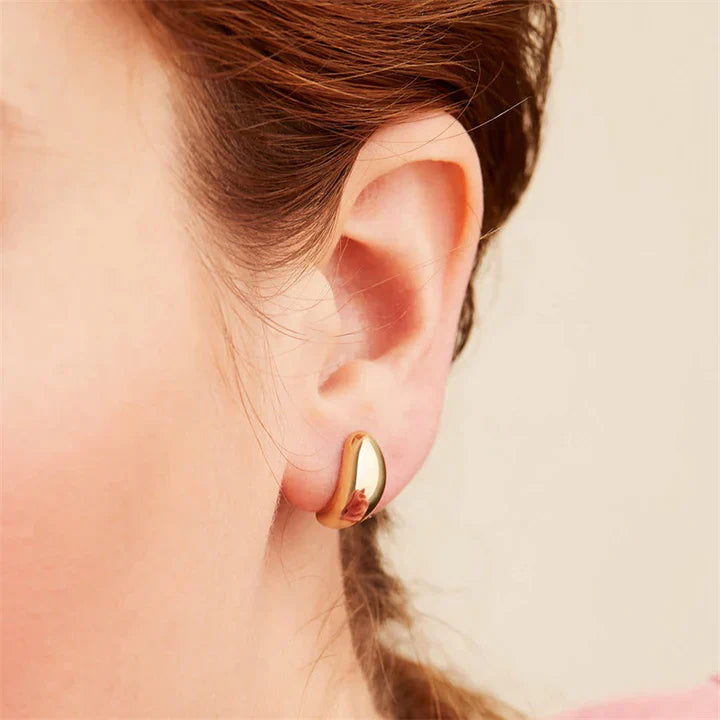 Sabella Lucerna oorbellen | Witgoud 18k
