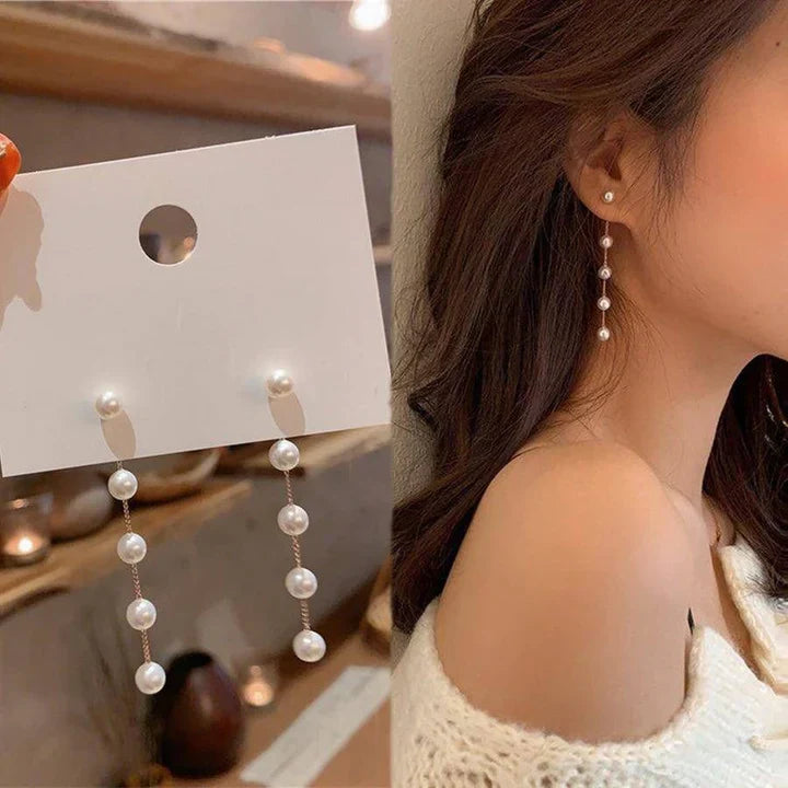 Silvia Luminara oorbellen | witgoud 16k